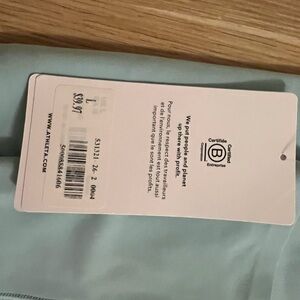 Athlete yoga pants. Salutation stash pocket 7/8. Teal green. NWT. Size L.